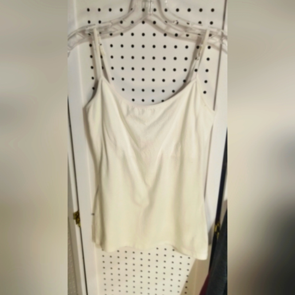 2-4-10$ White tank top by Body Bleu